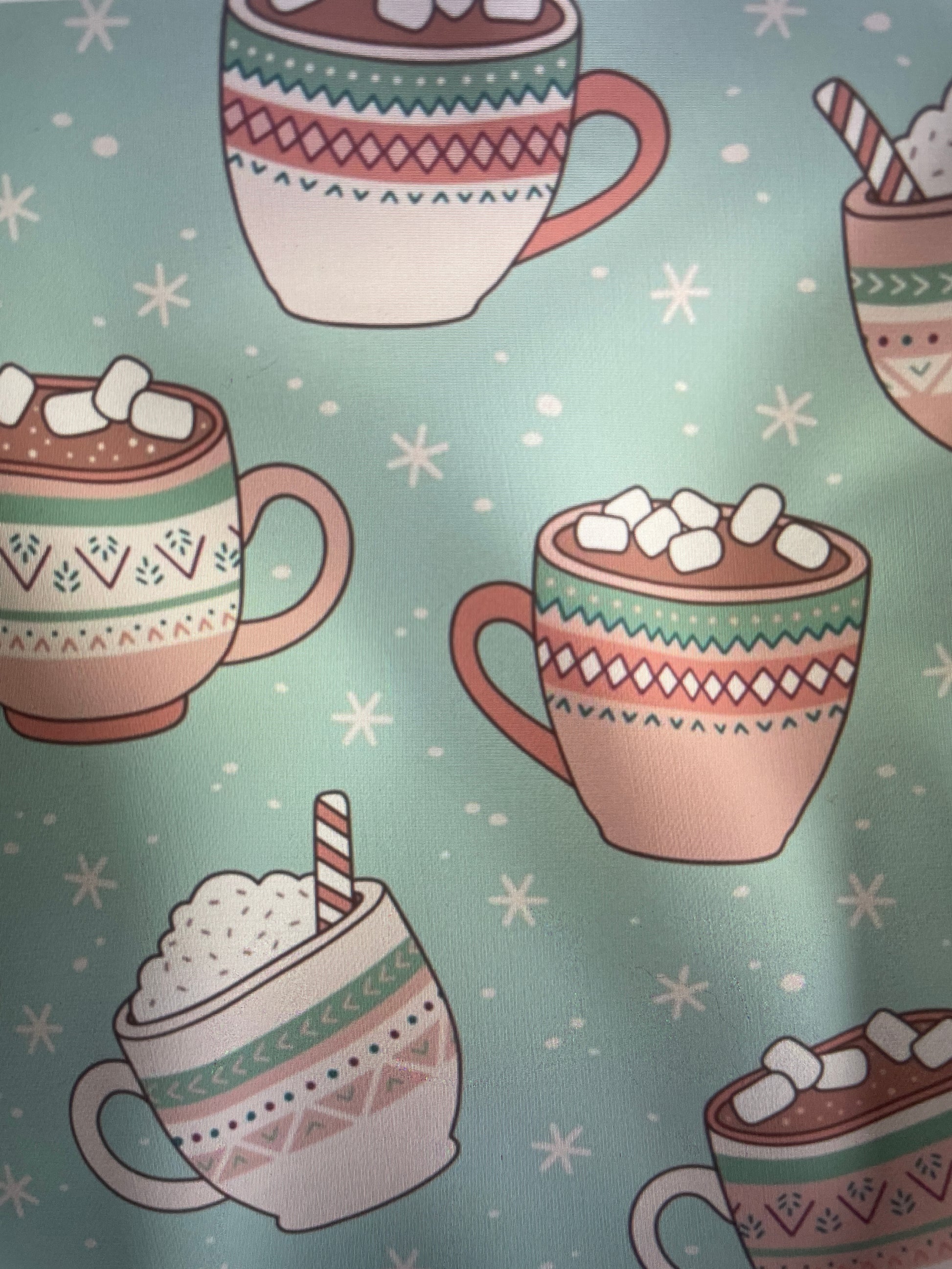 Hot chocolate cups with marshmallows and candy canes on mint background Amanda Bright Designs Couture Apron Christmas Holiday