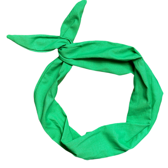 A solid kelly green tie headband made of cotton fabric for christmas holidays summer st. Patricks day