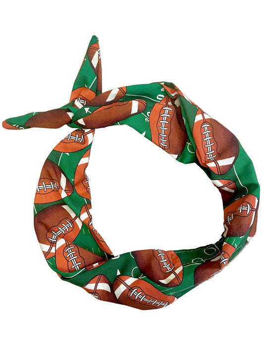Amanda Bright Designs Brown Laced Footballs on Green background Original Tie Headband