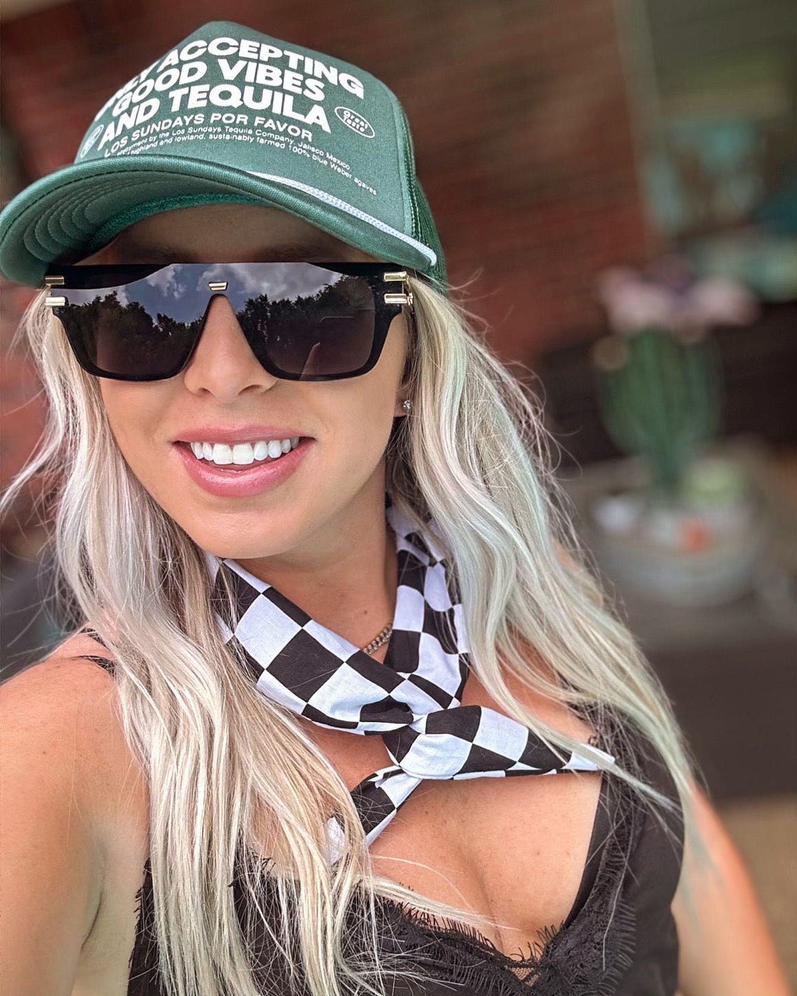 Amanda Bright Designs The Original Tie Headband Black and White Checkered Flag at racetrack
