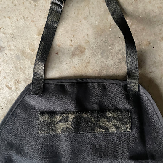 Amanda Bright designs black waterproof canvas apron the dutch Schwarzenegger patch area