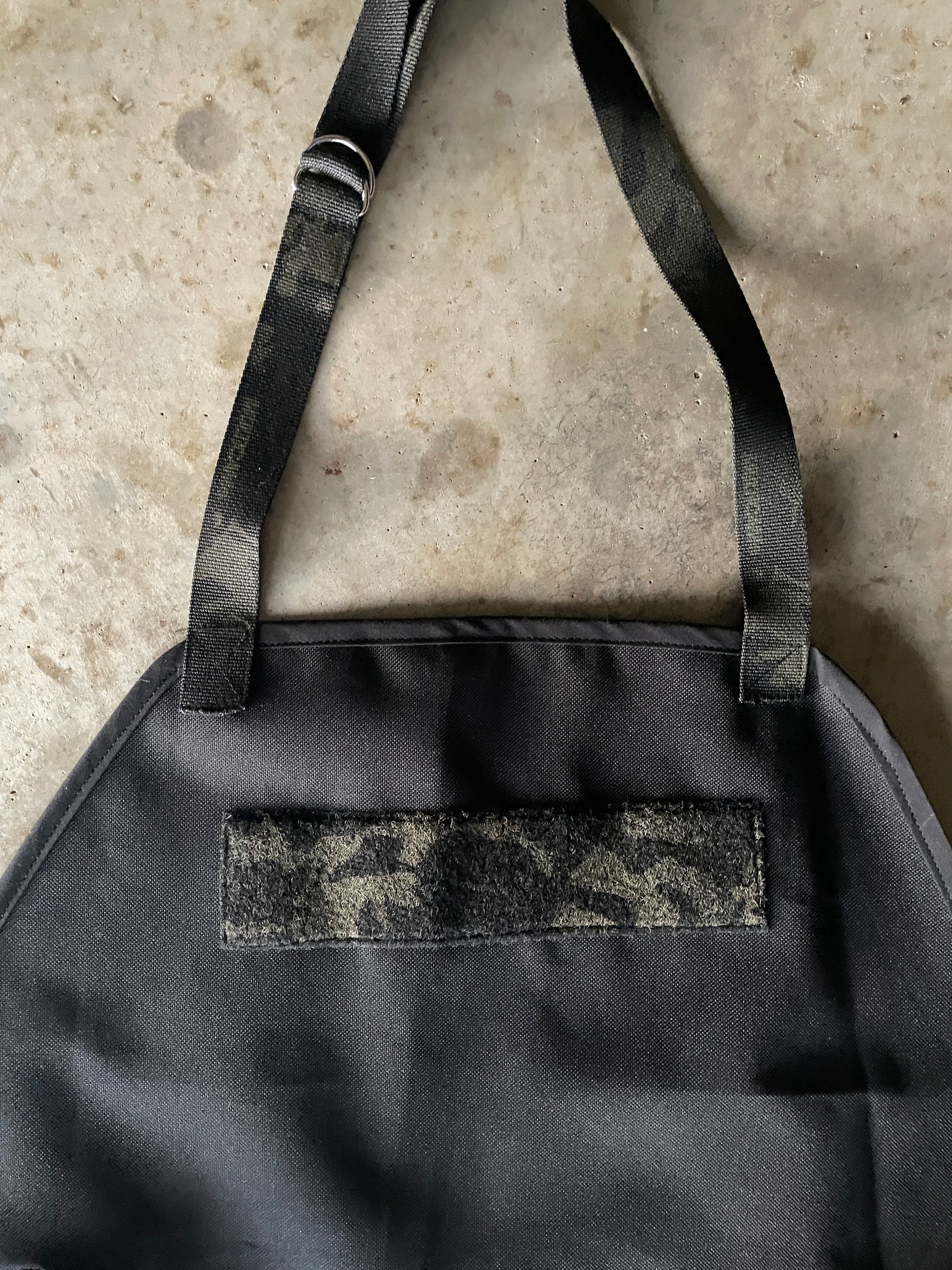 Amanda Bright designs black waterproof canvas apron the dutch Schwarzenegger patch area