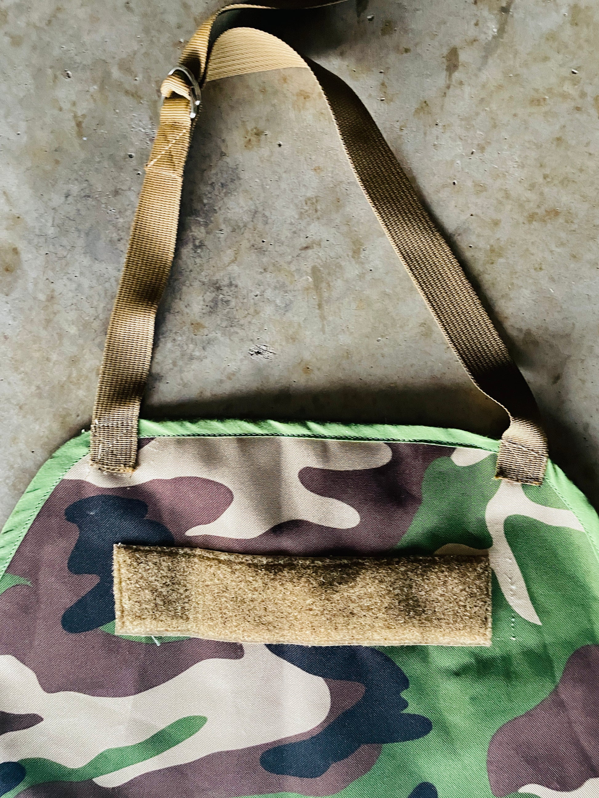 Amanda Bright designs the Rambo camouflage mens apron with coyote brown strings for bbq grilling