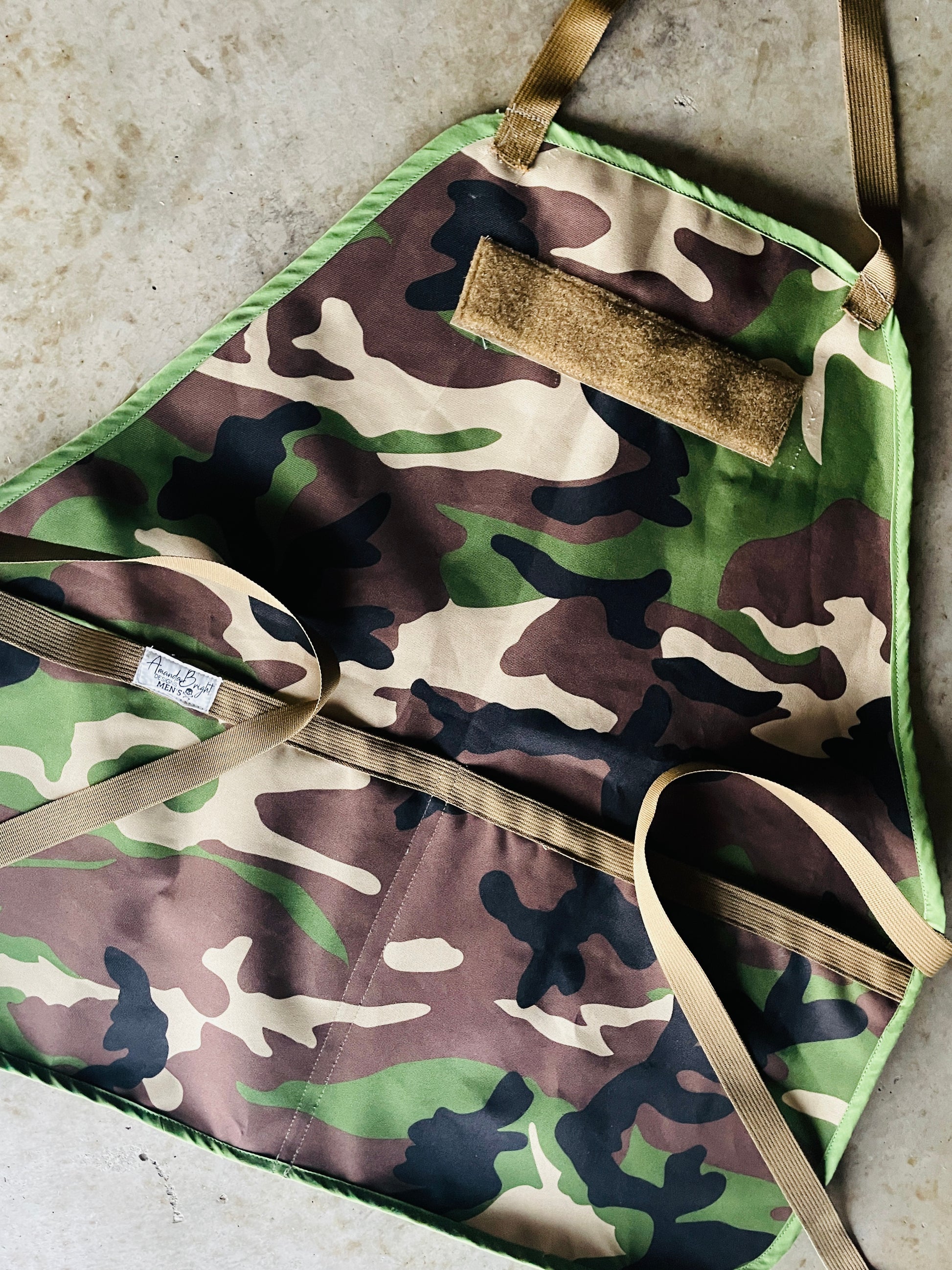Amanda Bright designs Rambo camouflage waterproof canvas aprons with coyote brown strings