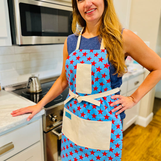 Two Medium Sized Ladies Betsy Ross kitchen apron fireworks stars and stripes American flag pattern fourth of july woman in her kitchen