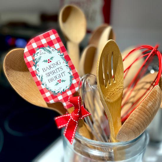Two Medium Sized Ladies Baking Spirits Bright silicone two sided spatula with red gingham check and wreath design decorated with festive red bow and loop for hanging