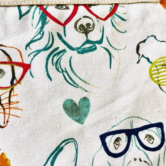 Two Medium Sized Ladies Iris Apron Dogs wearing glasses fashion fun colorful apron fabric pattern hound dog boxer golden retriever