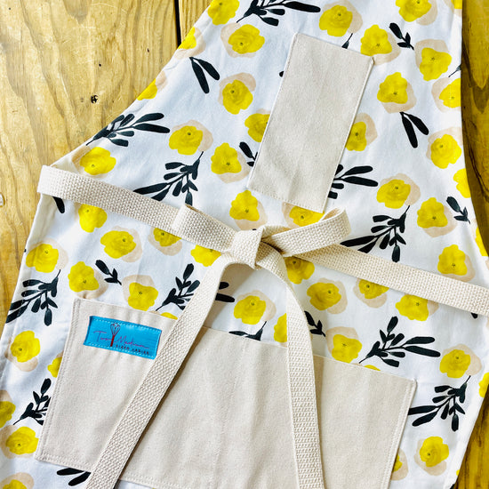 Two Medium Sized Ladies Rebecca vintage mod apron yellow flowers lack foliage midcentury retro designer vibe baking cooking gardening crafts everyday cotton canvas