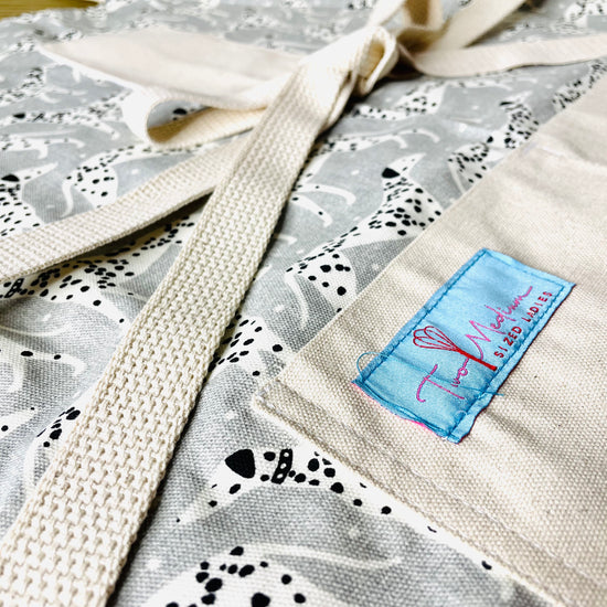 Two Medium Sized Ladies Vanessa apron Dalmatian print guard dog firehouse George Washington hunting dog close up view